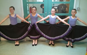Grade 1 students in Character Skirts ready for their exam